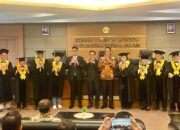Staf Khusus Menteri Hukum Yadi Hendriana Raih Gelar Doktor Ilmu Komunikasi